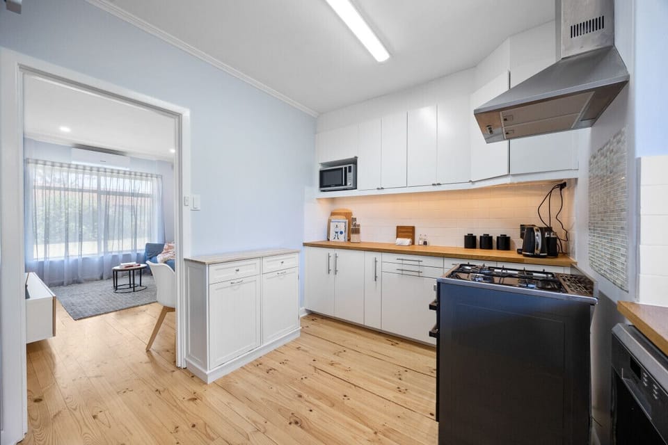 Prepare everything from quick breakfasts to relaxed dinners in the fully equipped kitchen, complete with modern appliances and generous bench space.