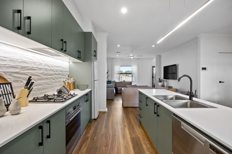 Well-equipped with modern appliances and ample cookware, the kitchen is designed for everything from casual breakfasts to indulgent dinners.