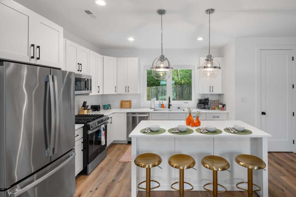 Sleek, fully equipped kitchen perfect for home-cooked meals and morning coffee.