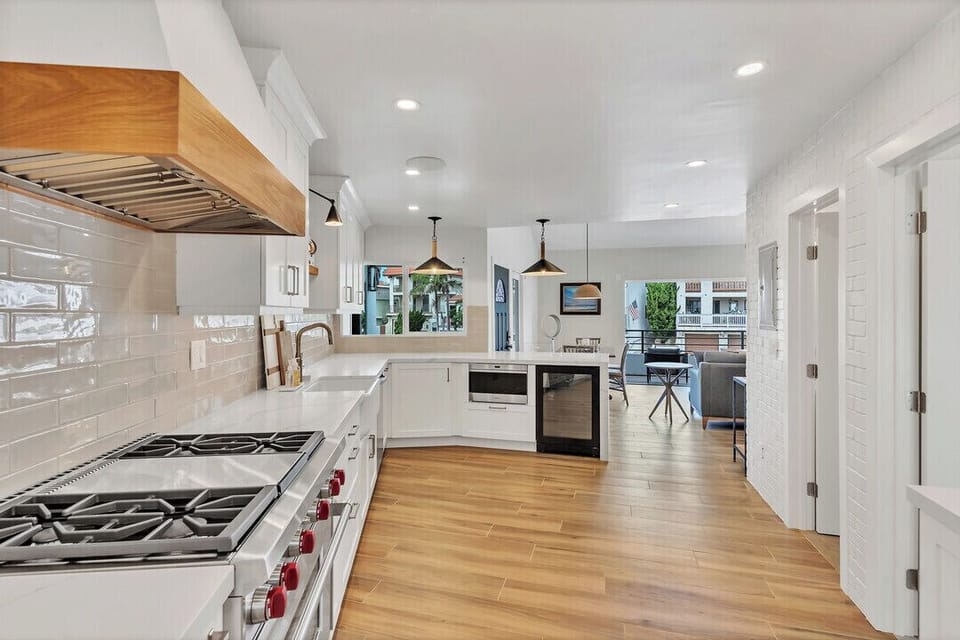 Kitchen- Gas stove, microwave, wine fridge, dishwasher and fridge