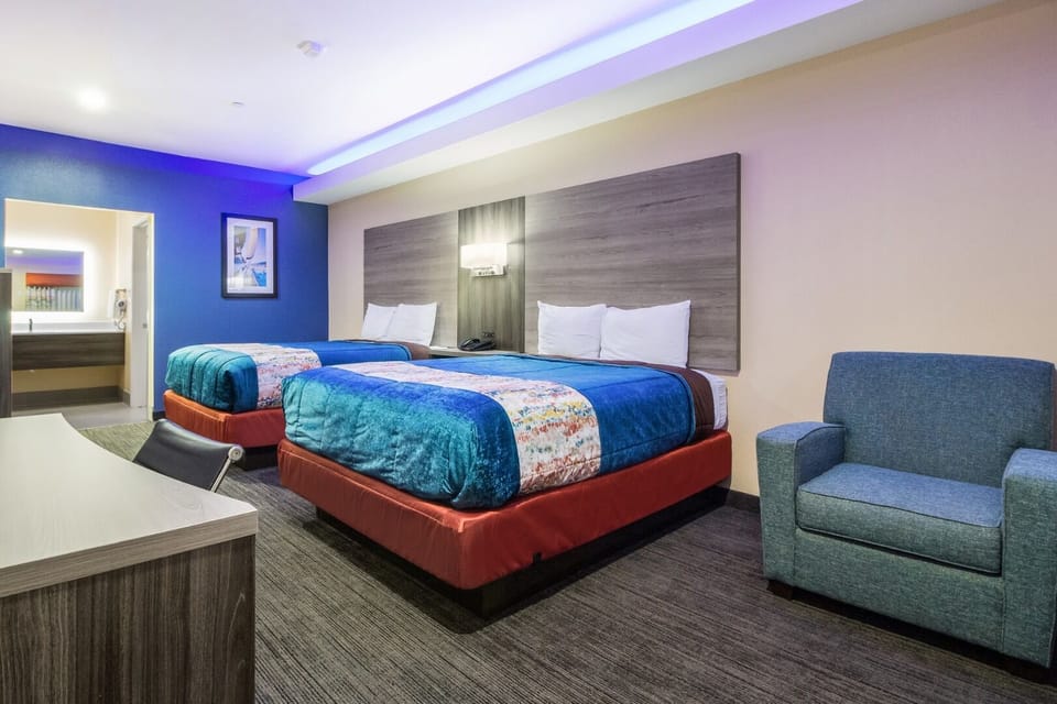 Stretch out with two plush beds under calming LED lights.