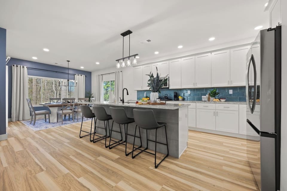 Relax in Style! 🛋️ Our spacious main living room offers plenty of seating, natural light, and a cozy ambiance—perfect for unwinding after a long day. 