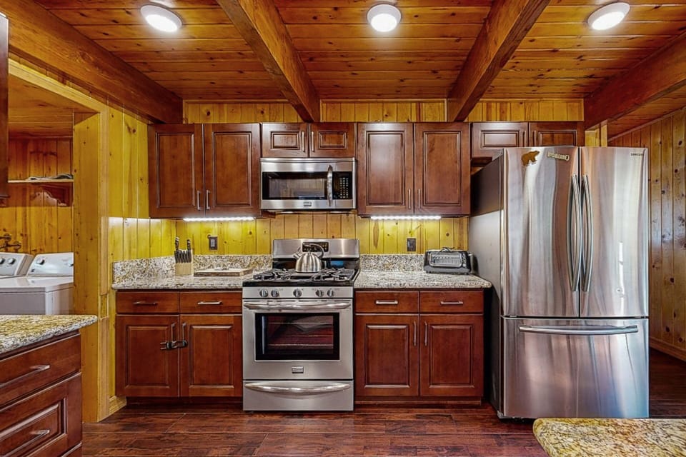 A modern, well-equipped kitchen for home-cooked meals. Please note: this kitchen does not include a dishwasher.