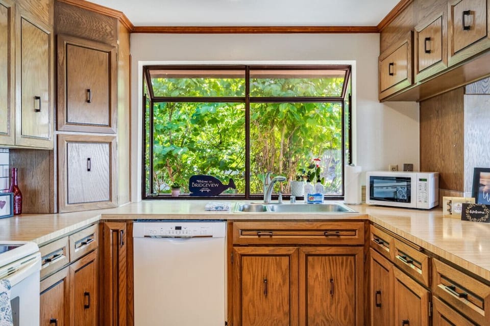 This bright kitchen offers both function and views!