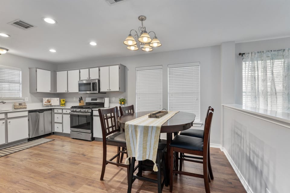 2 additional barstools stored in hallway closet if extra seating is needed.  