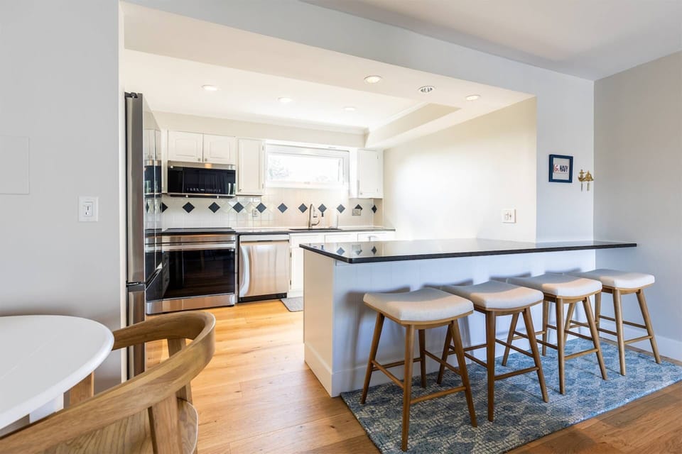 There's plenty of space to gather with family around the full kitchen.