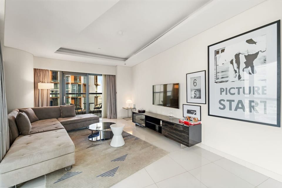 Living Room: Stylish retreat with vibrant art and stunning views for relaxation and fun gatherings!