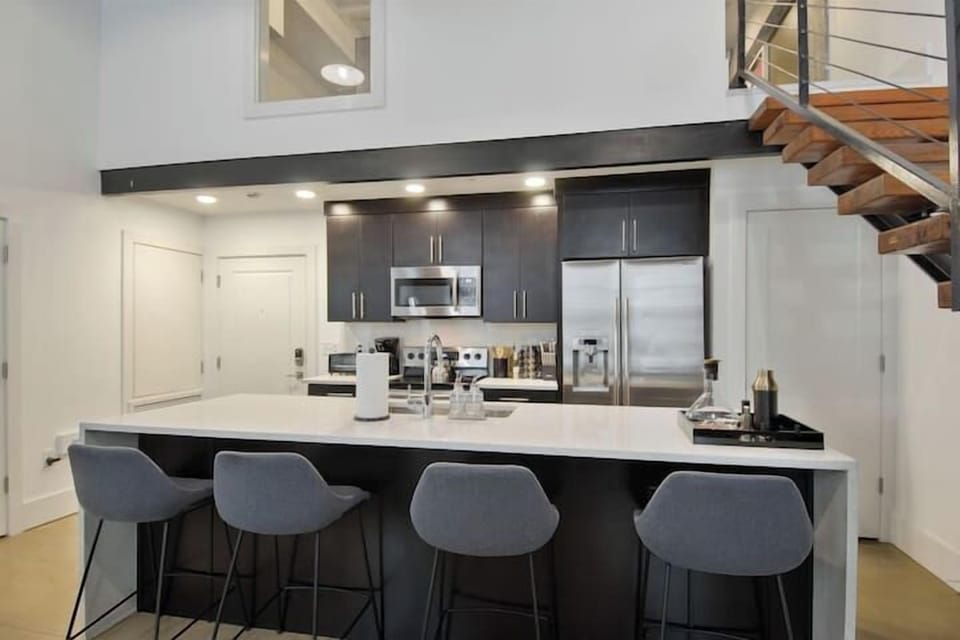 Kitchen bar has seating for 4