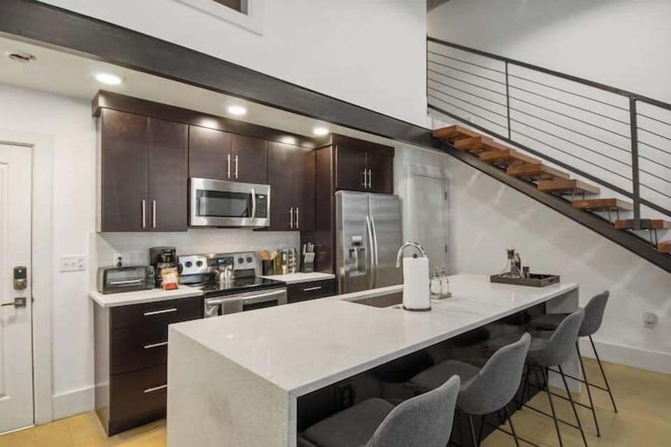 Kitchen bar has seating for 4