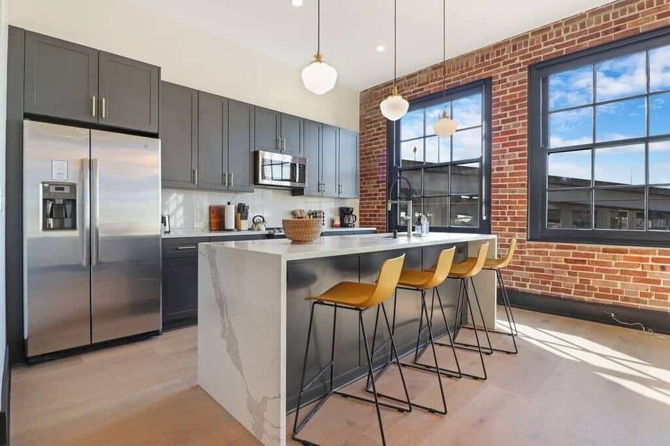 Kitchen bar has seating for 4
