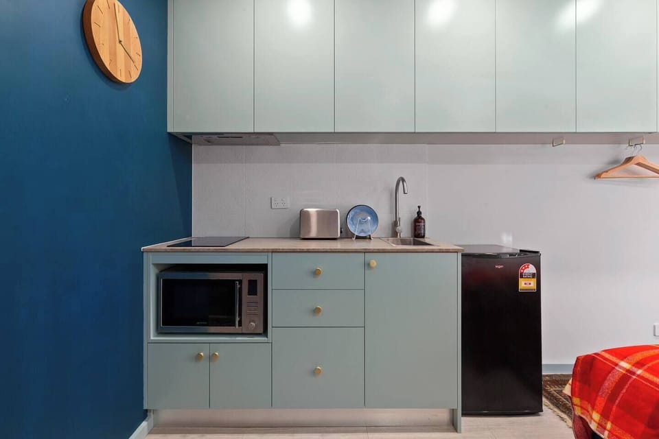 Prepare light snacks or brew your morning coffee in the compact kitchenette, complete with a stovetop, mini fridge, microwave, toaster, kettle and French press.