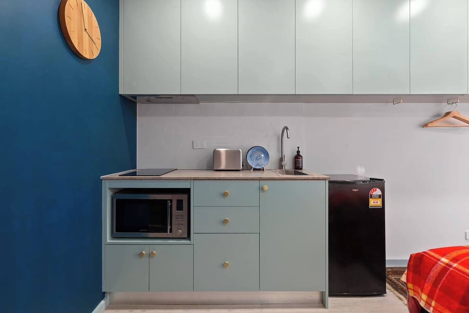 Prepare light snacks or brew your morning coffee in the second compact kitchenette, complete with a stovetop, mini fridge, microwave, toaster, kettle and French press.
