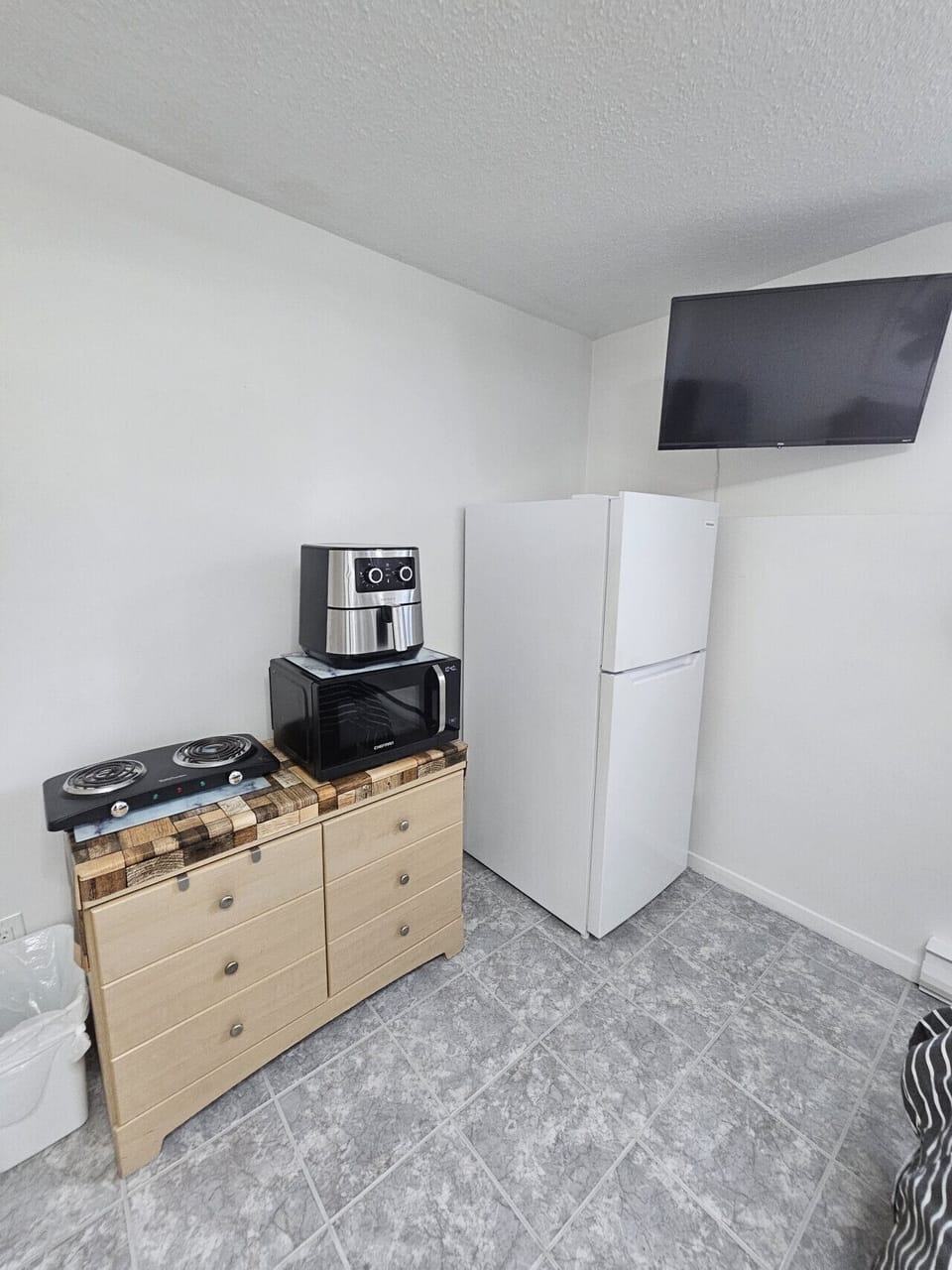Compact cooking station with appliances and storage drawers
