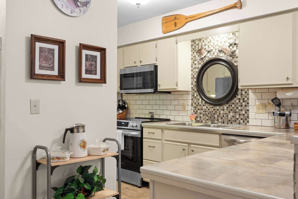 The open, airy kitchen offers ample space & every home comfort​