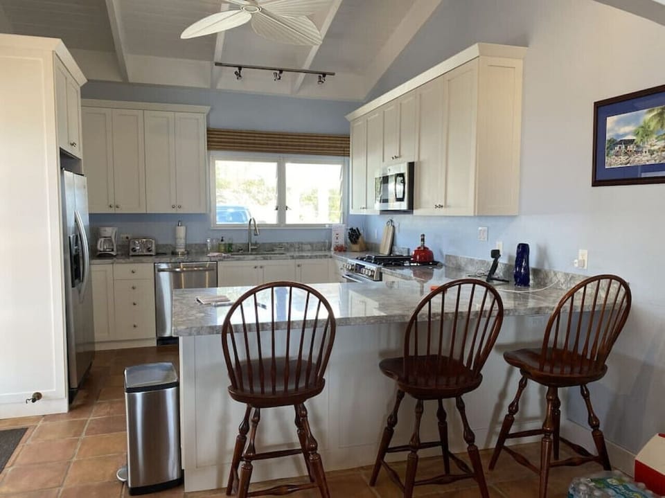 Kitchen with everything you need and bar side sitting