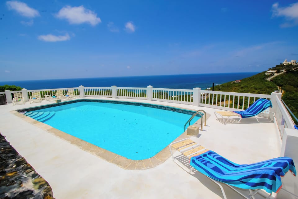 Pool view of the Caribbean Sea to take in the sea breezes