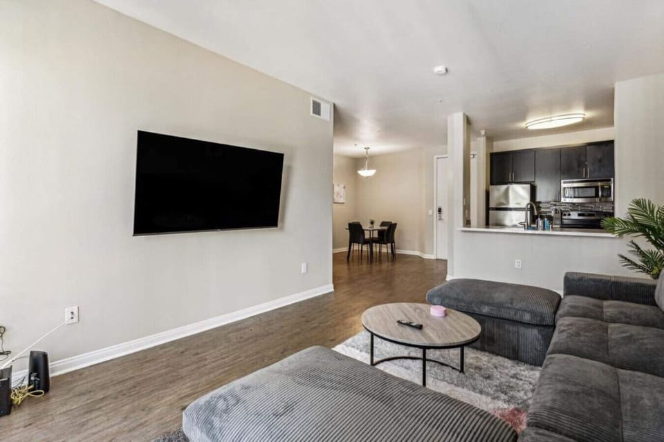 An inviting living room with comfortable cushioned seating!