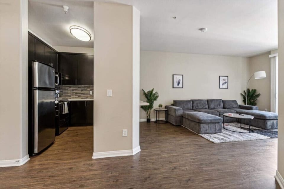 An inviting living room with comfortable cushioned seating!