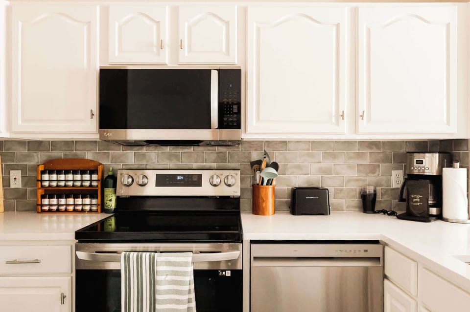 Kitchen with all stainless steel appliances