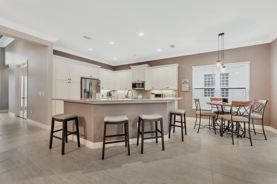 Open concept kitchen with seating for 8