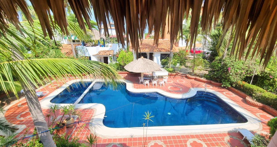 Gated community of El Pueblito shared swimming pool