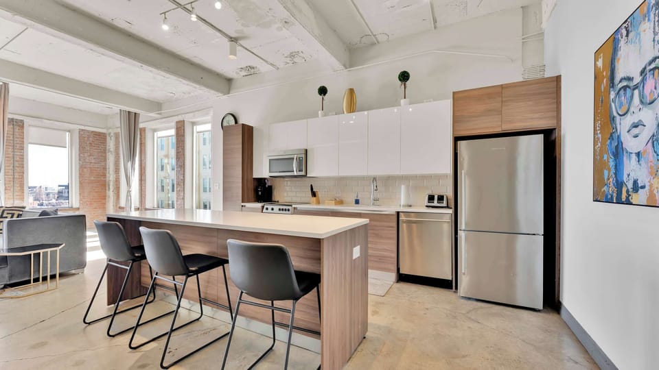 Kitchen: Sleek design with modern appliances and vibrant city views - perfect for culinary adventures!