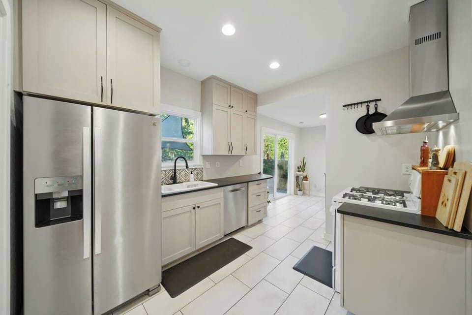 Stocked kitchen with newer appliances. 