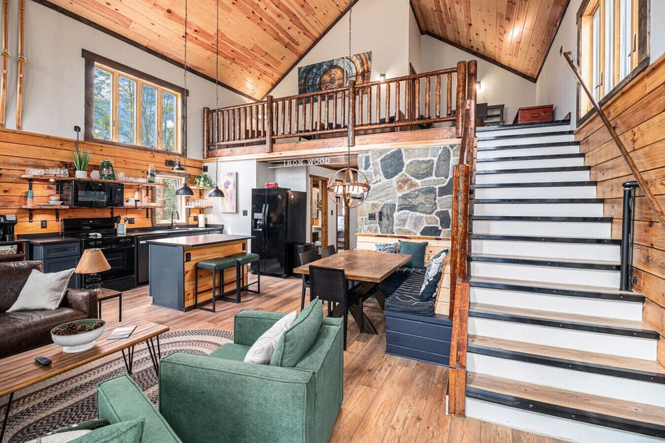Living room to loft and dining