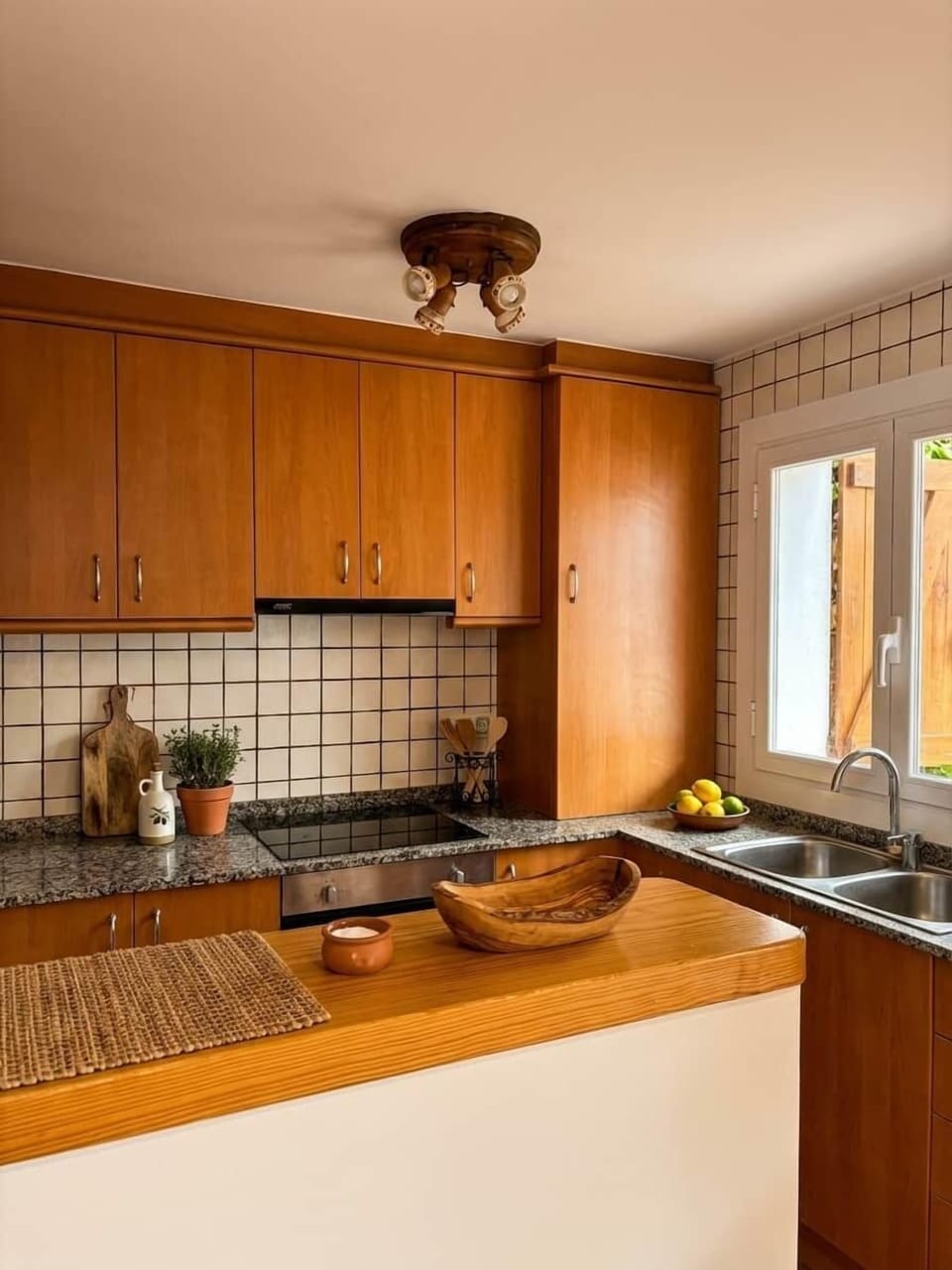 Compact Kitchen with Wooden Cabinets