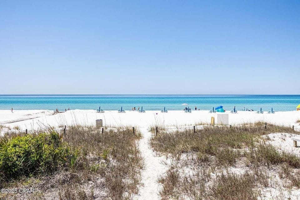 Step right onto the beach from your private balcony
