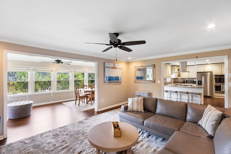 Open floor plan for the living room, kitchen and large sun room