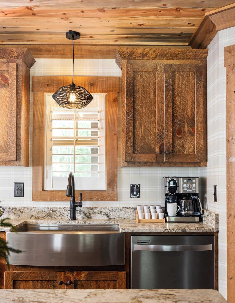 Enjoy cooking in our fully stocked kitchen, complete with premium appliances and a spacious island with bar seating—perfect for casual meals or morning coffee.
