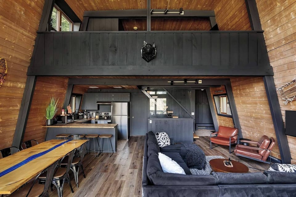 Enjoy stunning wood accents and modern elegance in this airy, stylish gathering space!