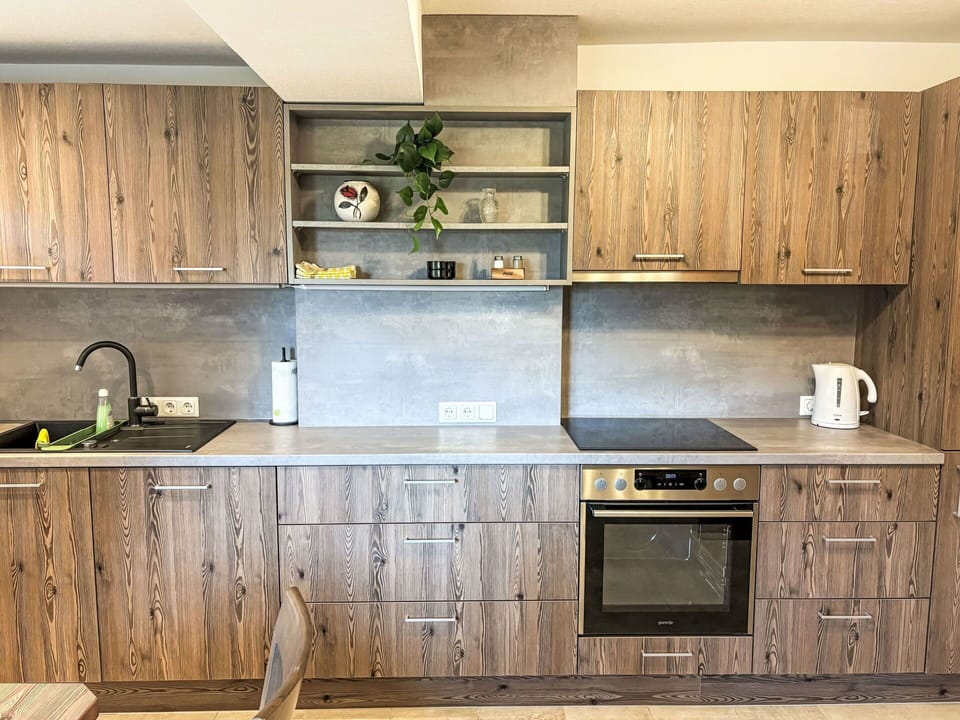 Cabinetry, Wood, Flooring, Countertop, Furniture, Interior Design, Cupboard, Drawer, Kitchen, Floor