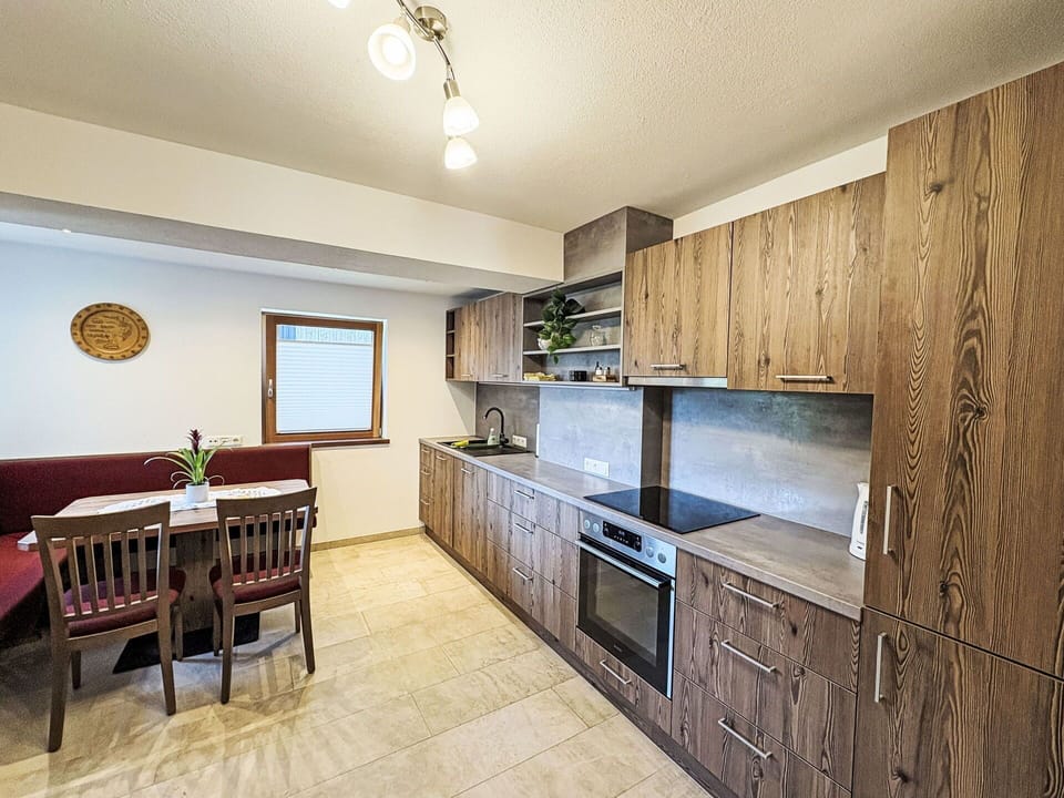 Wood, Flooring, Ceiling, Interior Design, Floor, Countertop, Room, Cabinetry, Furniture, Wood Flooring