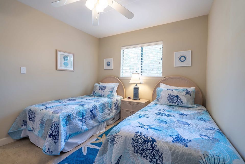 Comfortable guest room with plenty of storage and natural light.