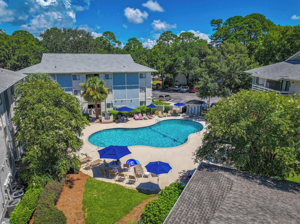 Cool off in the nearby pool, perfect for families or a post-beach dip.