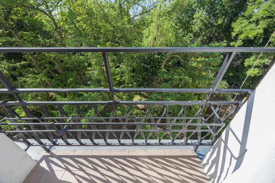 The balcony provides a perfect spot for enjoying the fresh air.