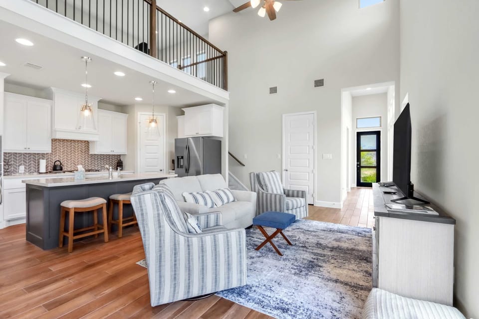 Curl up in the airy living room & stream your favorites on the smart TV​