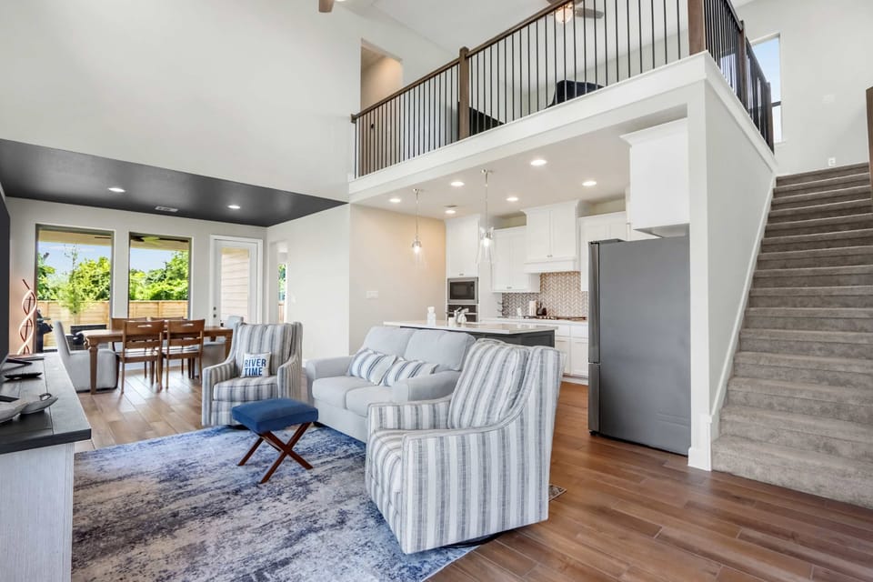 Curl up in the airy living room & stream your favorites on the smart TV​