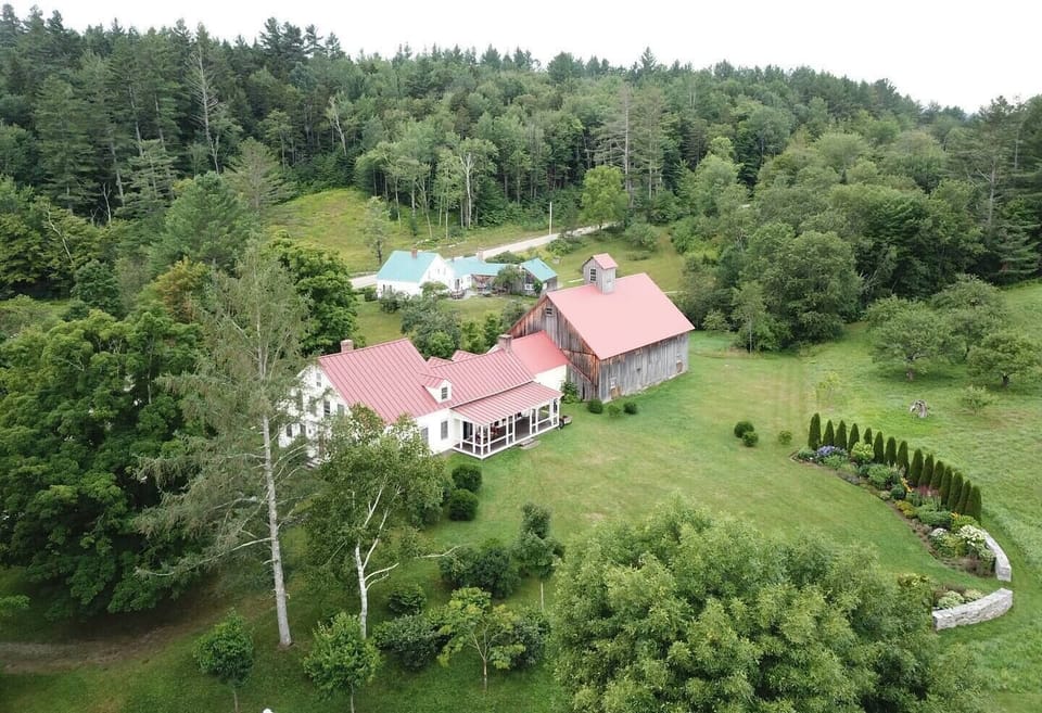 Aerial view of the house, barn and gardens