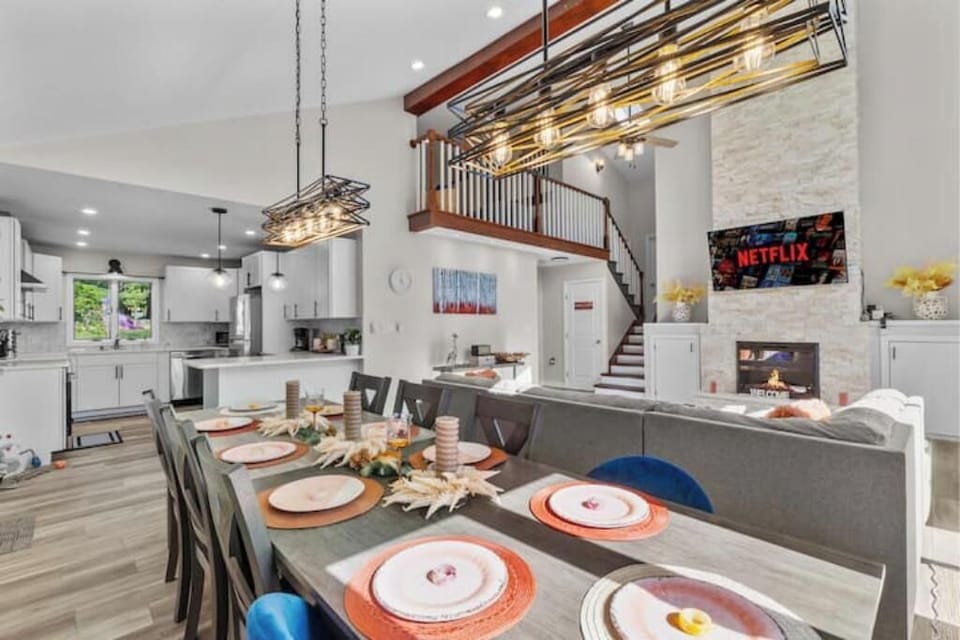 Gather around the spacious dining table with seating for 10.