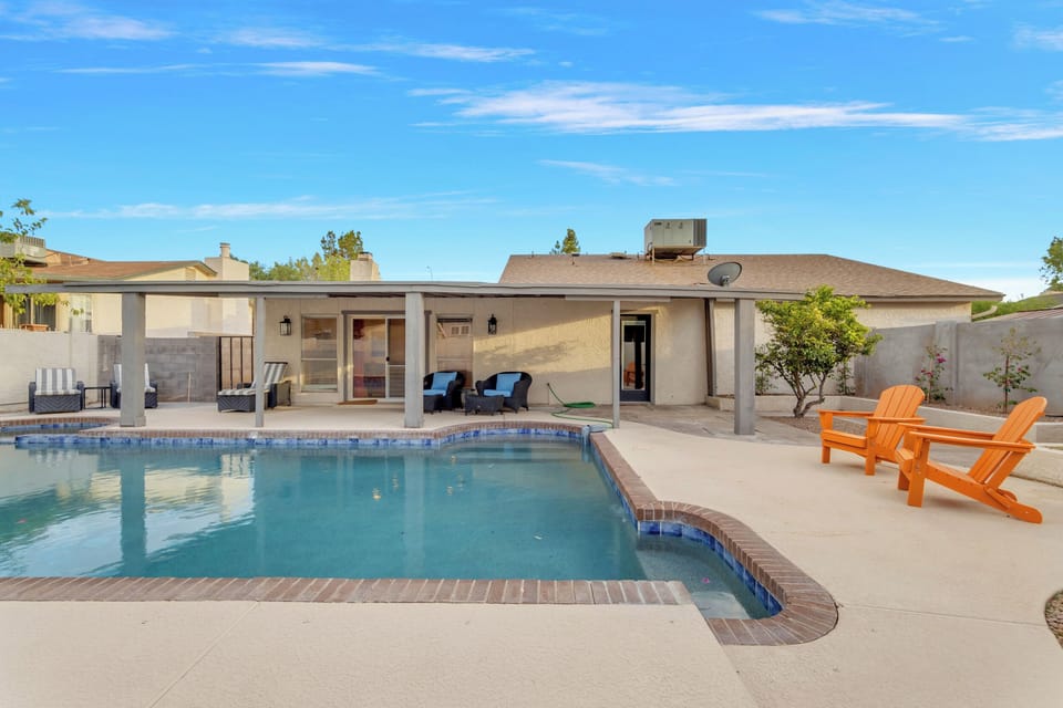 Soak up the sun and unwind poolside in your own private backyard oasis