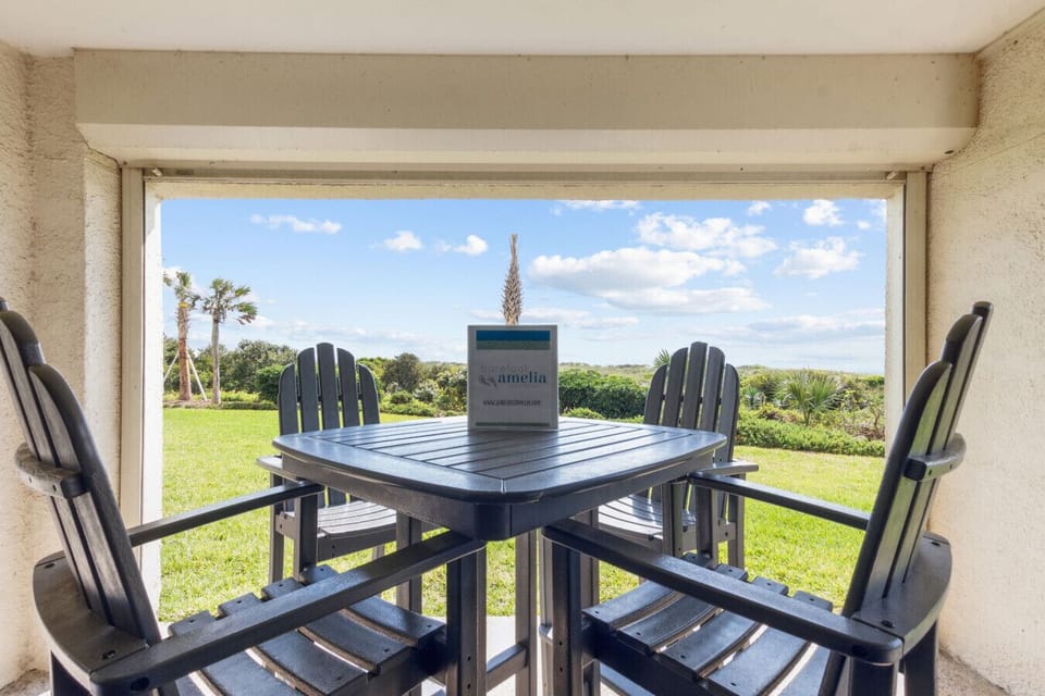 Patio with 4-person table and chairs