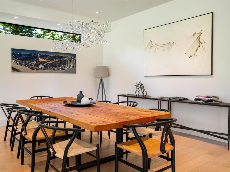 Tasteful dining room with formal seating for 10 guests