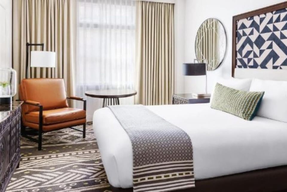 Unwind in plush bedding after a day in town.