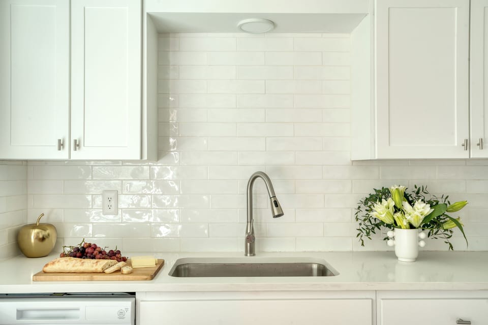 Cook and create in a kitchen filled with natural light, making meal prep a delight.