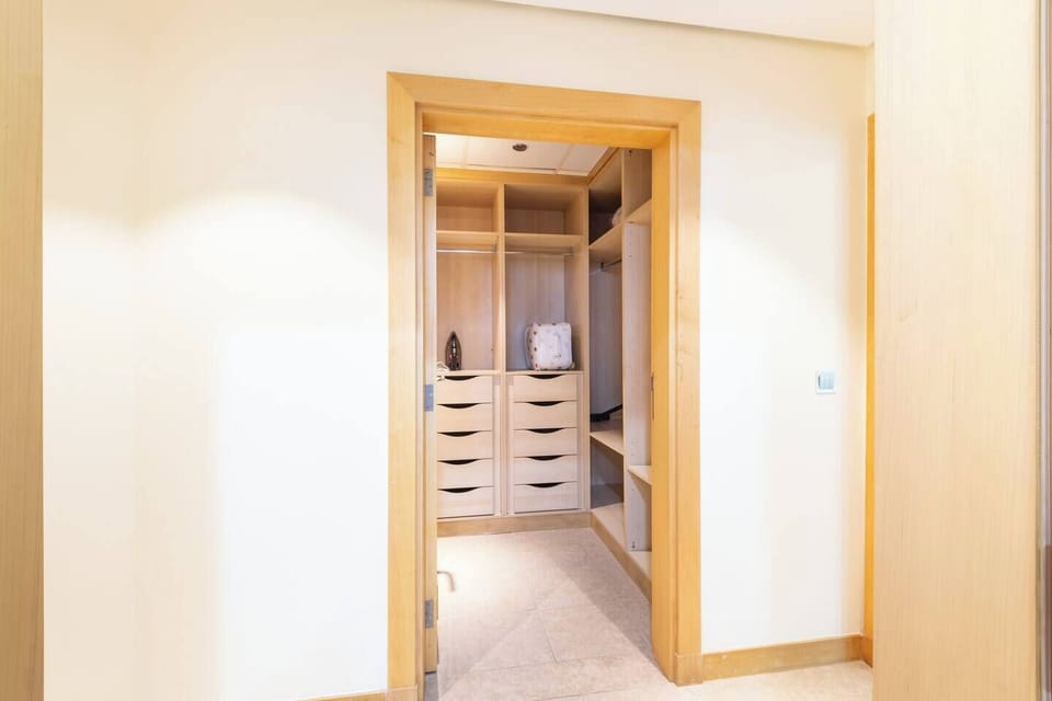 Equipped with shelving and hanging space, our walk-in closet helps you keep your belongings tidy and accessible.