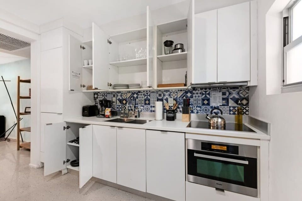 Experience gourmet living at the beautifully-designed kitchen of 250 Collins