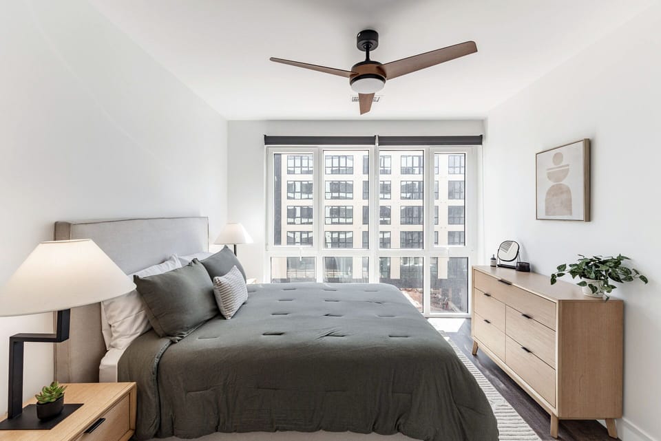Sink into a plush bed beneath a quiet, cooling ceiling fan.